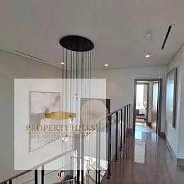 villa for sale in Zomra Compound on North 90th Street, directly wall-to-wall with Al Marasem and Palm Hills, in the heart of Golden Square.