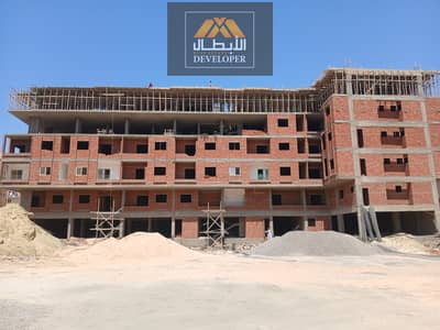 63 sqm apartment for sale on Hejaz Main Street, pool view, green contract, 30% down payment, and 20% cash discount.