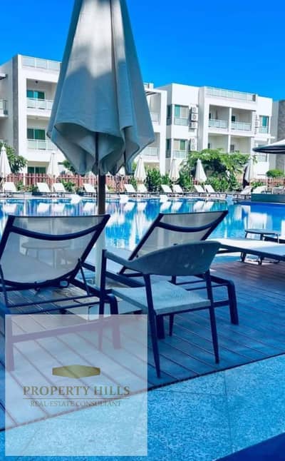 Receive immediately a hotel apartment in Marina Hills in front of the yacht marina by the sea with full finishing - Ain Sokhna