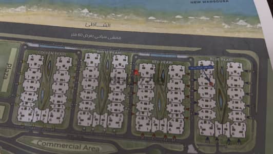 شقة للبيع في The Pearl المنصورة الجديدة رابع مطل من البحر
