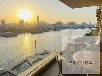 Fully finished and furnished hotel apartment managed by the InterContinental Hotel, featuring appliances and a full view of the Nile; rental return ca