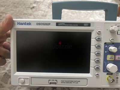 oscilloscope hantek 2 channels لم يستخدم و كامل بجميع كابلاته وملحقاته