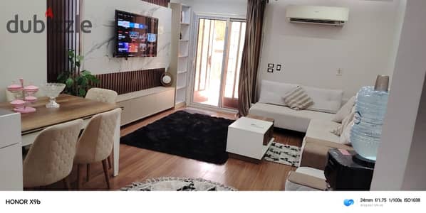 In Al-Rihab, a furnished apartment with a garden on the fifth for quick rental