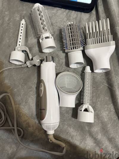 Panasonic hair brush 6 heads and a bag