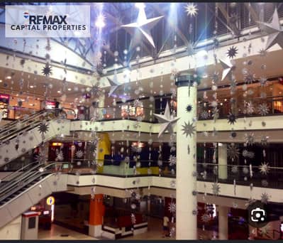 محل للبيع 14م (10م مساحه داخليه + 4م مساحة خارجيه) في Glita Mall  ال R3  العاصمة الإدارية