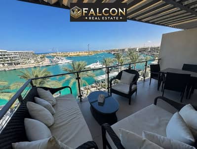 Seafront property with the largest marina and yacht harbor on the North Coast for sale. Fully finished, high-end unit with a crystal lagoon view in Ra