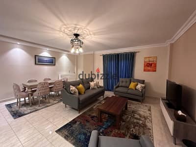 Apartment furnished for rent in Al Rehab, first occupancy, modern furnishings, fully specialized finishes, 2 bedrooms, long and short-term periods, American kitchen, complete air conditioning, full appliances