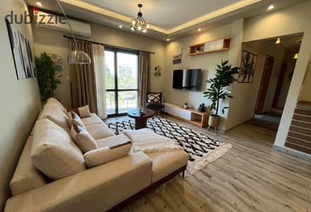 لعشاق التميز شقه فندقيه 2 نوم فيوعلى اكبر حديقه مفروشه مودرن بالكامل  فى Eastown Sodic