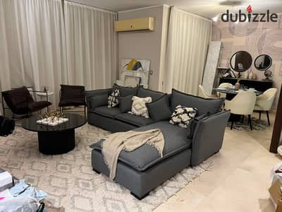 شقة Fully Furnished للايجار في Village Gate | 149م + Garden 80م | 2 Bedrooms | Parking Slot | جاهزة للسكن بسعر 65,000 جنيه