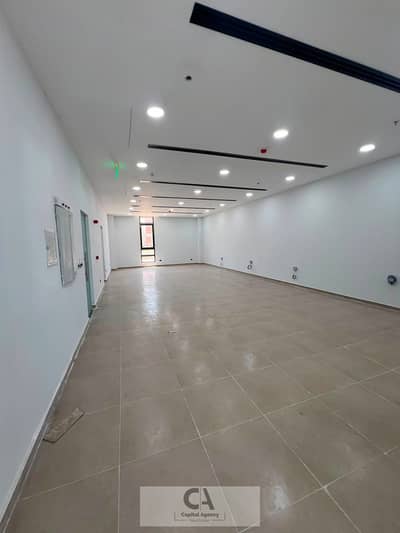 Office space for rent in District 5, 550 sq m, at a bargain price, near the Ring Road - finished with air conditioning - Fifth Settlement