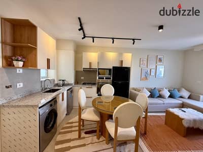 Lowest price Fully Finished & Furnished chalet for resale at MV Rhodes  Ras El Hekma  Ready to move