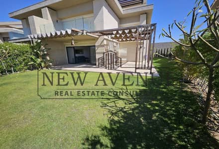 شاليه بجاردن مفروش بالكامل بالتكيفات في سوان ليك الساحل الشمالي Swan Lake North Coast الصف الثاني من البحيرة