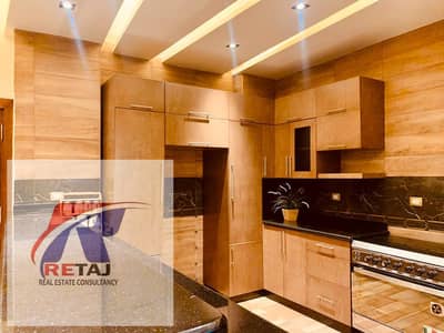 Furnished apartment in the First District, Fifth Settlement, with a garden and a stunning view.
