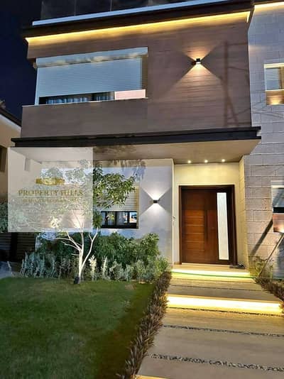 Villa for sale in Azar Compound 2 with a lower down payment in the heart of the Golden Square, minutes to the Middle Ring Road and the Sokhna Road Villa for sale in Azar Compound 2 with a lower down payment in the heart of the Golden Square, minutes to the Middle Ring Road and the Sokhna Road