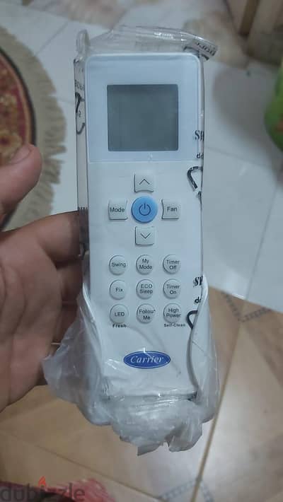 ريموت تكييف Carrier اصلي جديد بالكيس RG67N10