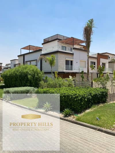 Villa for sale with a 5% down payment from La Vista next to AUC, equipped with full finishing in a compound of villas only in the heart of the Golden Square La Vista Patio Town - Fifth Settlement