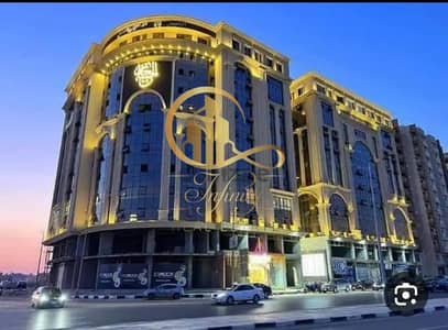 Office for rent with air conditioning only in Gran Plaza Al-Hijaz Tower near the ring road, Carrefour, and Al-Khamsin Mall, Zahra Al-Maadi