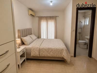 For daily, weekly, and monthly rent in a chic building next to City Center Makram Abid, steps to Nasr Road and City Stars, a fully equipped furnished air-conditioned apartment Super Lux
