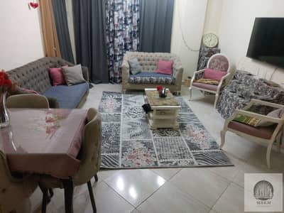 Apartment for sale in Dar Misr Al Andalus, Fifth Settlement, 100 square meters, ground floor, 2 bedrooms + reception + 1 bathroom, with a designated g