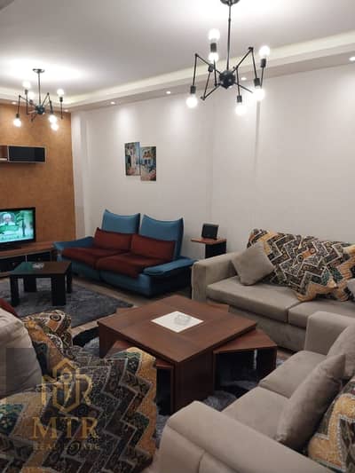 Furnished apartment for rent with distinctive finishing, located near the Old Market and all essential services in Al Rehab.