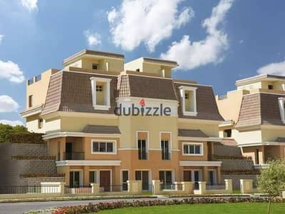Townhouse for sale with a sea view and prime location; directly adjacent to Madinaty on the Suez Road. 50% discount for cash payment.