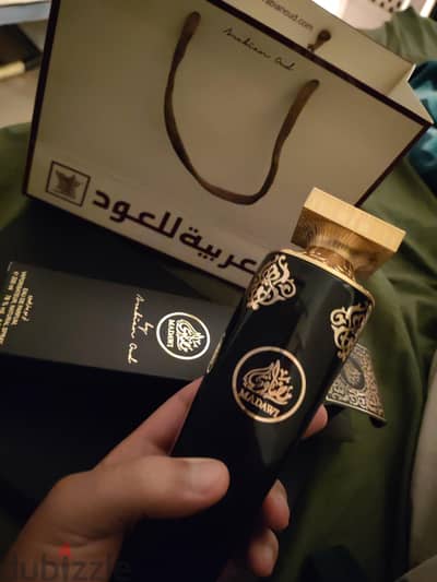 عطر مضاوي 200 مل استخدمت 2 مل