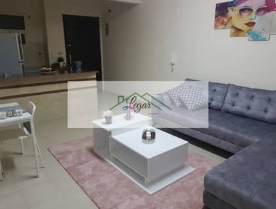 Ground floor apartment with garden for rent in Al Mustaqbal. 2 fully furnished bedrooms at a bargain price.