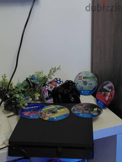 ps4 slim 500gb مع العاب ديجيتال والعاب cd