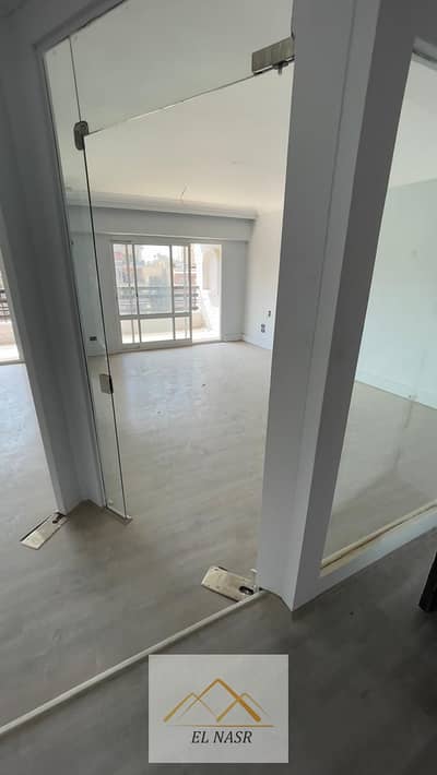 Administrative or residential apartment 290m for rent on Makram Ebeid street next to Mahgoub and near the intersection of Mostafa El Nahas with Makram Ebeid minutes from Abbas Al Akkad, Al-Tayran, and Al-Nasr Road