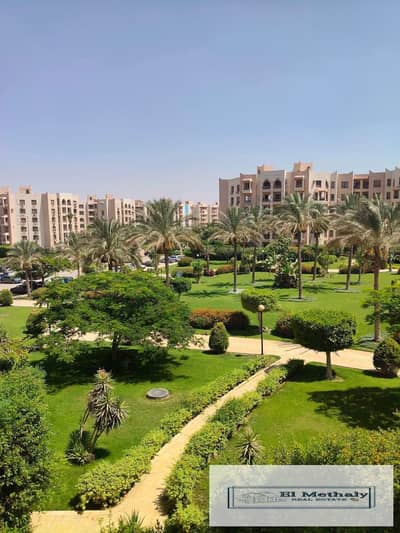 Freehold apartment for sale in Al Rehab City, New Cairo, with a wide garden view.