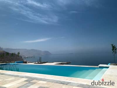Chalet for sale at a special price, ready for immediate occupancy, fully finished, in Ilmont Galala, Ain Sokhna, with a stunning direct sea view, corn
