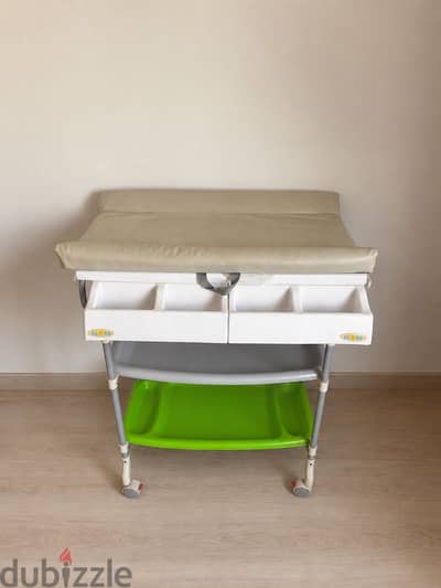 Baby changing table and bathtub