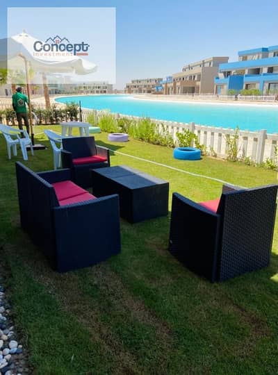 شاليه للبيع في BO Islands La Plage الساحل الشمالي | صف أول لاجون | 133 متر + حديقة 100 متر | مفروش بالكامل