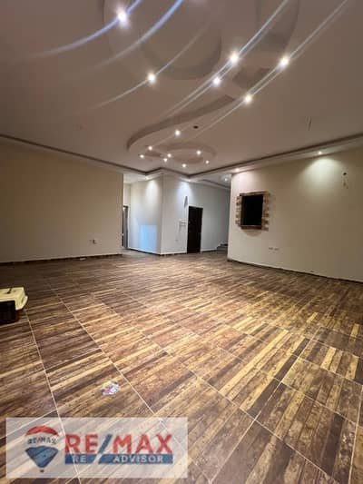 Apartment for rent with kitchen and water heaters. Sheikh Zayed, Al Yasmin Compound, next to Gate 2, opposite the entrance to Rawdat Zayed and the Can