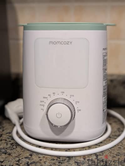 Momcozy milk warmer and milk bags