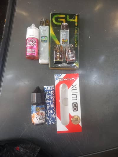 فيب uwell g4 للبيع ومعاها ٣ كارتدج و نص قزازة زيت فريسكي ٩ نيكوتين