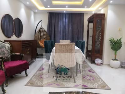Furnished apartment for rent in Al Khamael Compound, Sheikh Zayed, fully air-conditioned, prime location