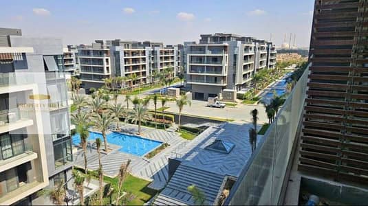 Apartment for sale with a cash discount in the Patio Oro compound in the heart of the Fifth Settlement