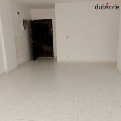 Apartment for rent unfurnished 123 sqm third floor elevator next to the Old Market Food Court and all services company finishings in Al Rehab 1