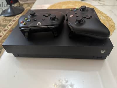 Xbox one x with 2 controllers
