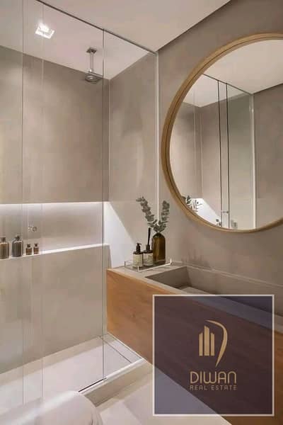 -OFFER  Fully finished apartment for sale . ready to move , located directly on Mohamed Naguib Axis and the Cairo-Suez Road (New Cairo), at a