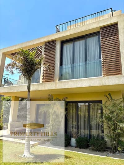 Receive a finished villa from Sodic with master rooms, a garden view in front of Madinaty - Sodic East - Al Shorouk