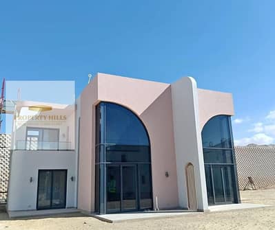 Chalet 3 rooms for sale at cash price ready for delivery in June Sodic Ras Al-Hikma with a panoramic view directly on the lagoon