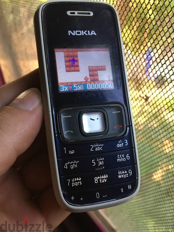 ‏Nokia 1208 8