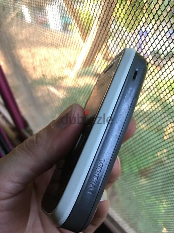 ‏Nokia 1208 9