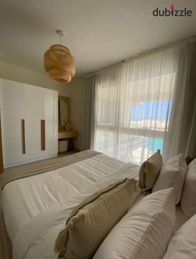 Fully Finished pool view chalet with garden for Sale in LYV Ras El Hekma Next to Mountain View