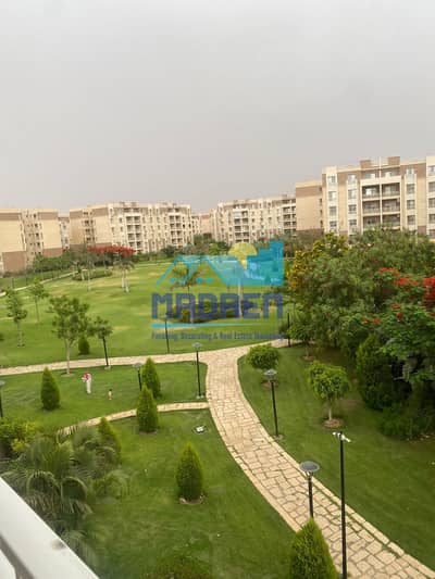 For sale in Madinaty, an apartment 96 meters b7 garden view