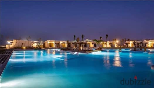 شالية للبيع بسعر مميز و متشطب بالكامل فى قريه دى باي من شركة تطوير مصر يقع بجوار لافيستا بالساحل الشمالي بتسهيلات فى السداد