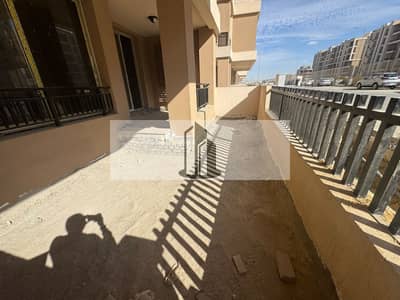 Ready-to-move-in ground floor apartment with garden in Taj Sultan, located in one of the best phases of Taj City.
