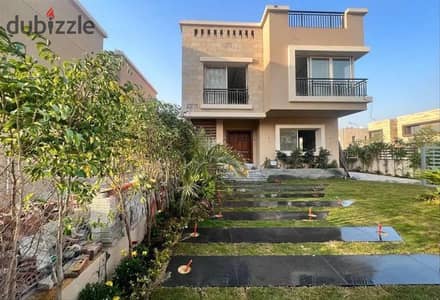 Villa for sale, ready for immediate delivery, in Taj City, New Cairo | Fully finished, featuring a 240m² garden and a landscape view.